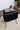 Black Tringle Suede Ottoman With Fabric Leg & Gold Cap - JAIPURIA EMPORIUM