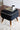 Black Suede Ottoman With Polished Leg & Golden Cap - JAIPURIA EMPORIUM