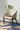 Classic Carved Wooden Barrel Chair with Checkered Fabric Upholstery