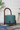 Teal Velvet Wooden Handle Pouffe – Compact Modern Accent Seating